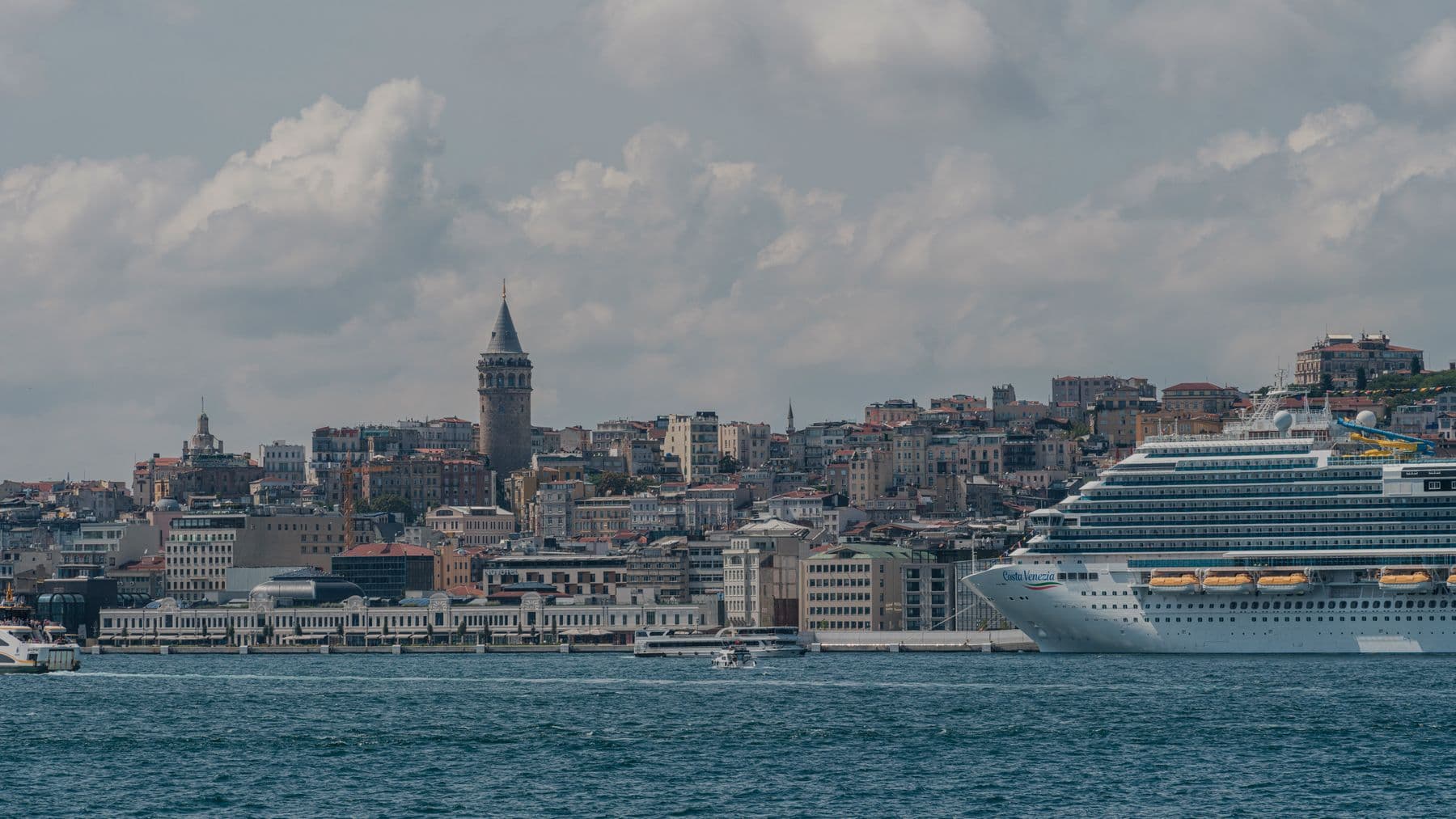 Istanbul skyline with the Galata Tower and a cruise ship on the Bosphorus